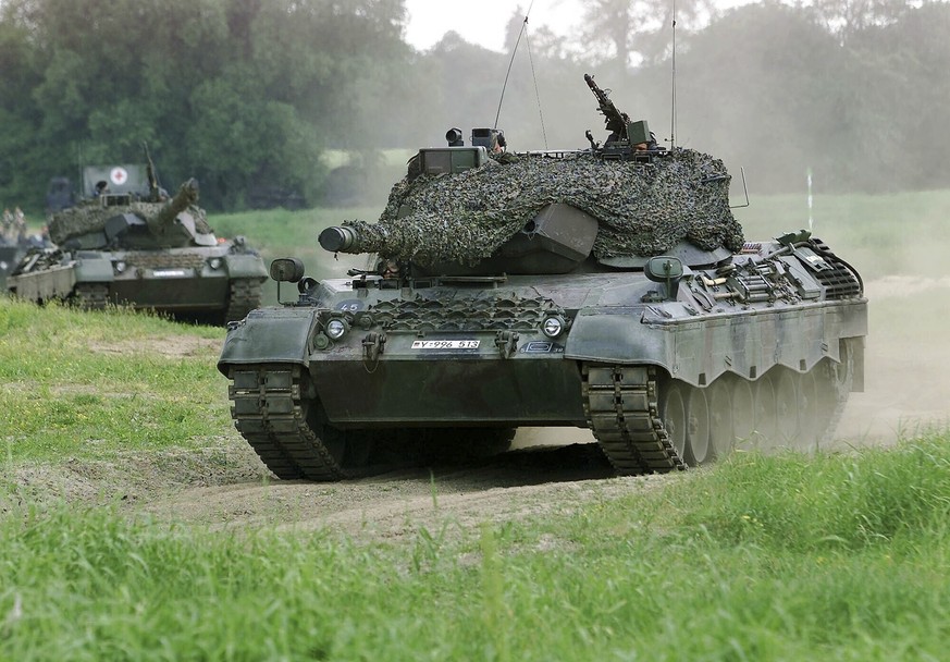 FILE - A Leopard 1 tank drives in Storkau, Germany, on May 19, 2000. Ukraine may be able to add old Leopard 1 battle tanks from German defense industry stocks to deliveries of modern tanks that German ...