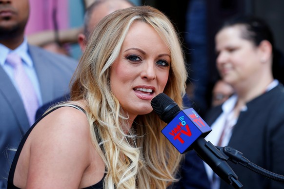 FILE PHOTO: Stormy Daniels, the porn star currently in legal battles with U.S. President Donald Trump, speaks during a ceremony in her honor in West Hollywood, California, U.S., May 23, 2018. REUTERS/ ...