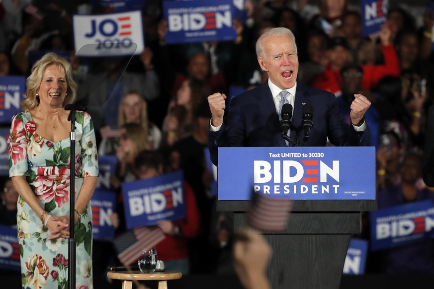Democratic presidential candidate former Vice President Joe Biden, accompanied by his wife Jill Biden, speaks at a primary night election rally in Columbia, S.C., Saturday, Feb. 29, 2020. (AP Photo/Ge ...