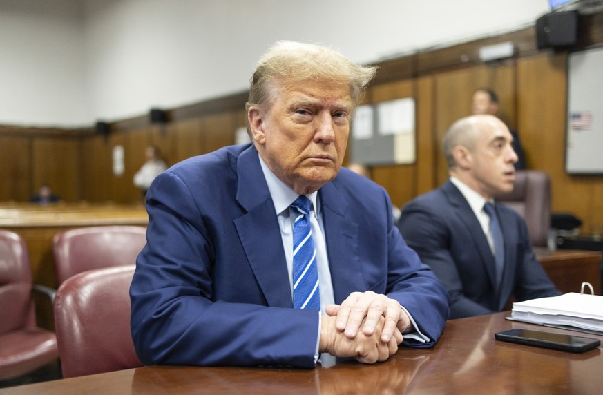 Former President Donald Trump awaits the start of proceedings on the second day of jury selection at Manhattan criminal court, Tuesday, April 16, 2024, in New York. Donald Trump returned to the courtr ...