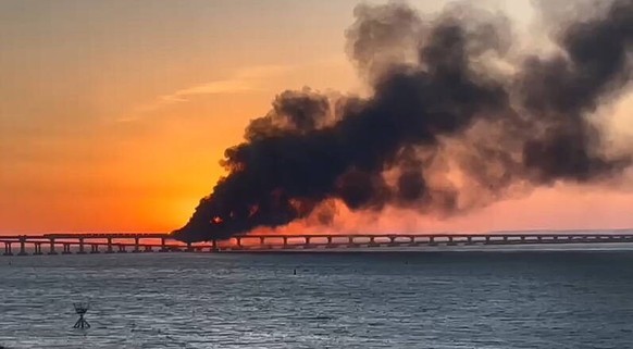 Russia. Kerch. OCTOBER 8, 2022. Fire on a section of a bridge linking Crimea to mainland Russia. According to preliminary information, a fuel storage tank is on fire. Traffic has been temporarily susp ...