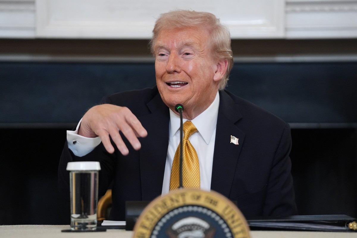 President Donald Trump answers questions from reporters during a roundtable on criminal cartels in the State Dining Room of the White House, Thursday, Oct. 23, 2025, in Washington. (AP Photo/Evan Vucc ...