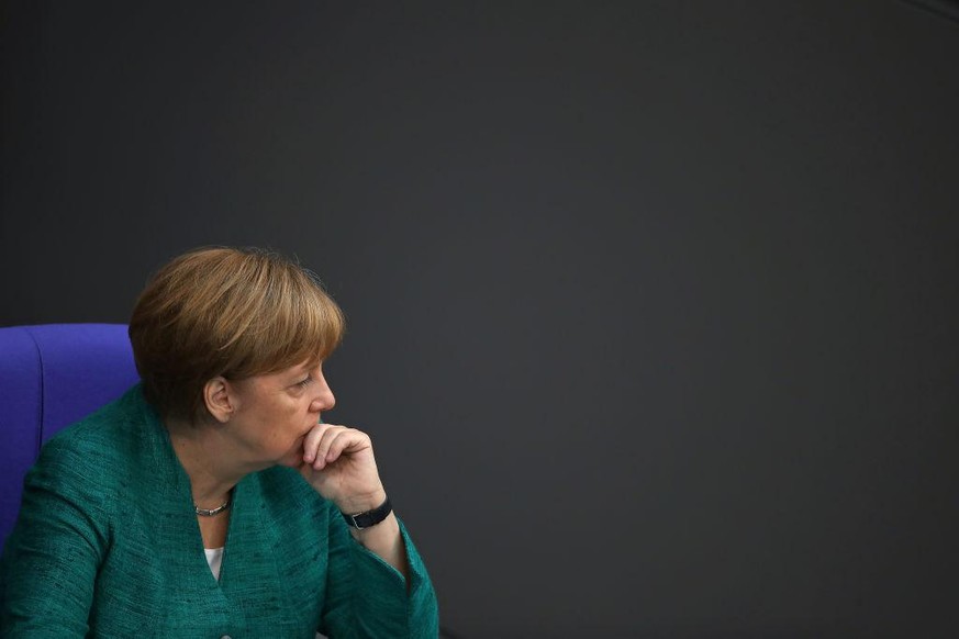 BERLIN, GERMANY - JUNE 28: German Chancellor Angela Merkel sits don after she gave a government declaration at the Bundestag ahead of the upcoming E.U. and NATO summits on June 28, 2018 in Berlin, Ger ...