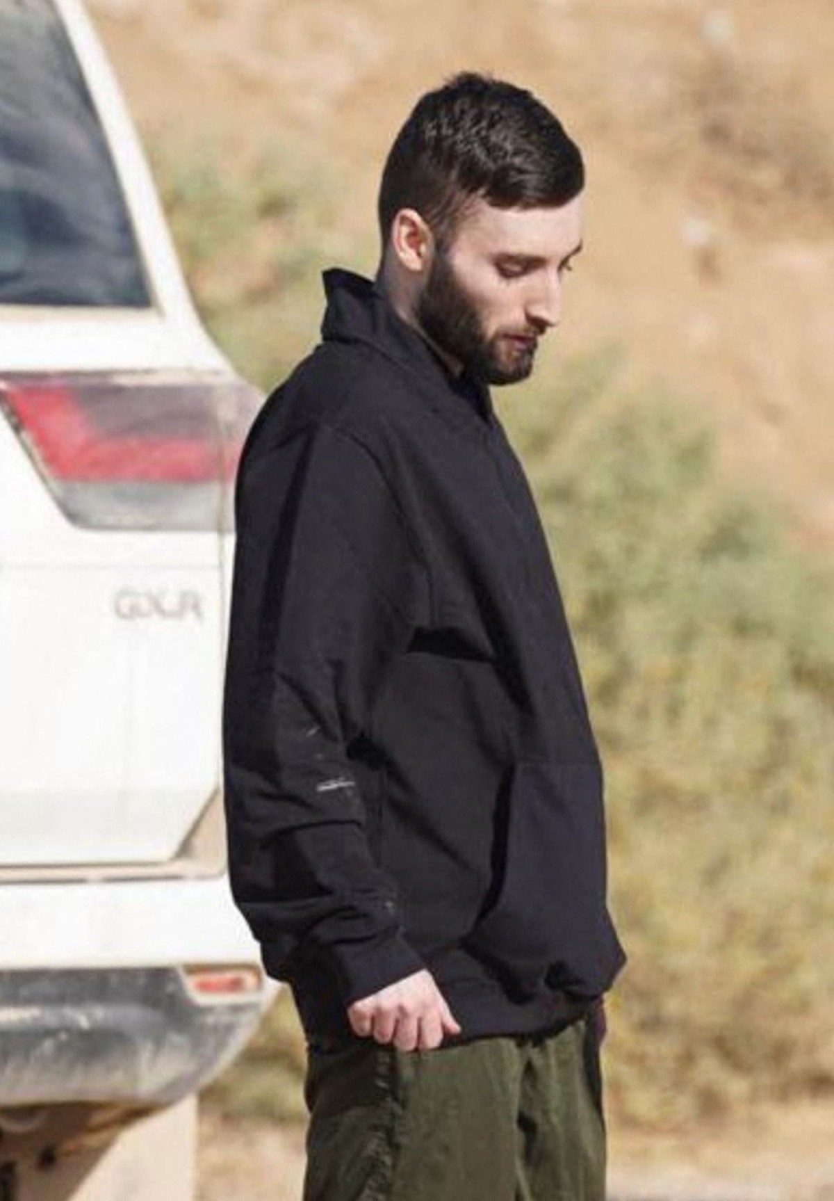 Released Israeli hostage, Matan Angrest, held in Gaza since the deadly October 7, 2023 attack by Hamas, speaks with a representative of the Israeli army after being released, as part of a prisoner-hos ...