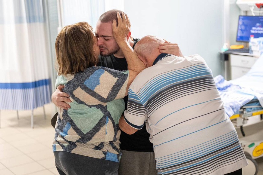 Almog Meir Jan 21 is reunited with his family after being rescued from Gaza in a special operation on Saturday, June 8. 2024. This morning, in a joint operation held by the Israel Defense Forces, ISA, ...