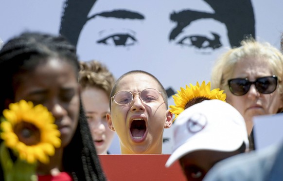 Activist, gun control advocate, and Stoneman Douglas High School shooting survivor Emma Gonzalez participates in the National March on the NRA in front of the NRA Headquarters on August 4, 2018 in Fai ...