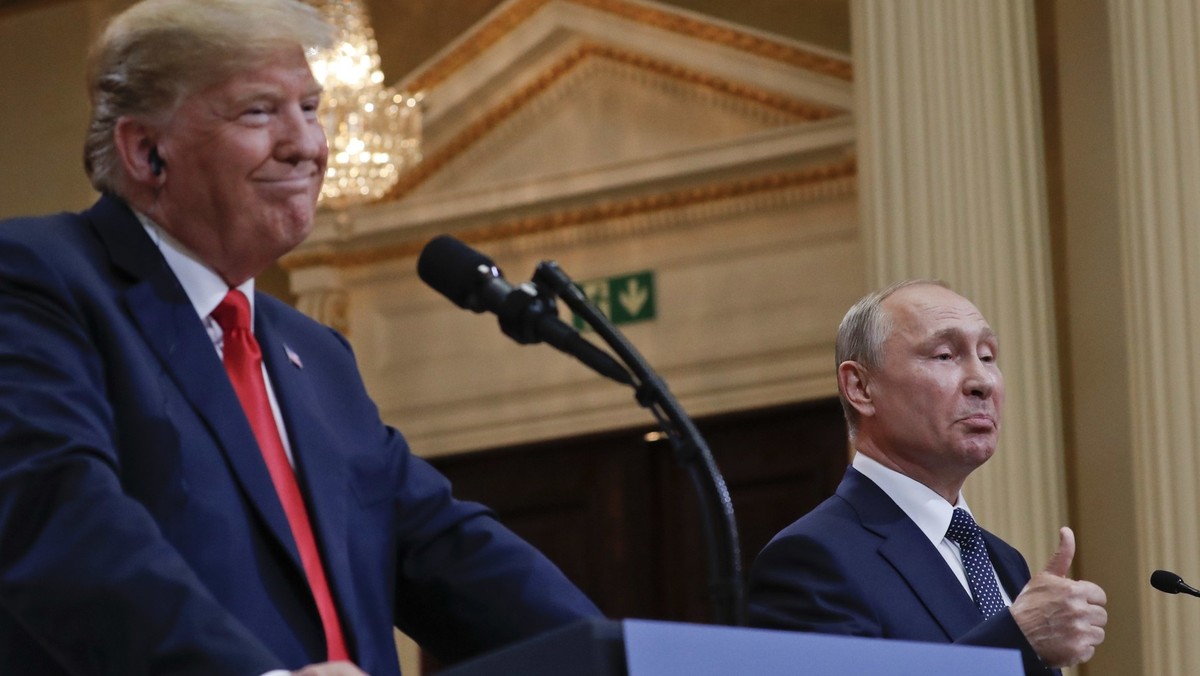 FILE - Russian President Vladimir Putin, right, and U.S. President Donald Trump give a joint news conference at the Presidential Palace in Helsinki, Finland, July 16, 2018. (AP Photo/Pablo Martinez Mo ...