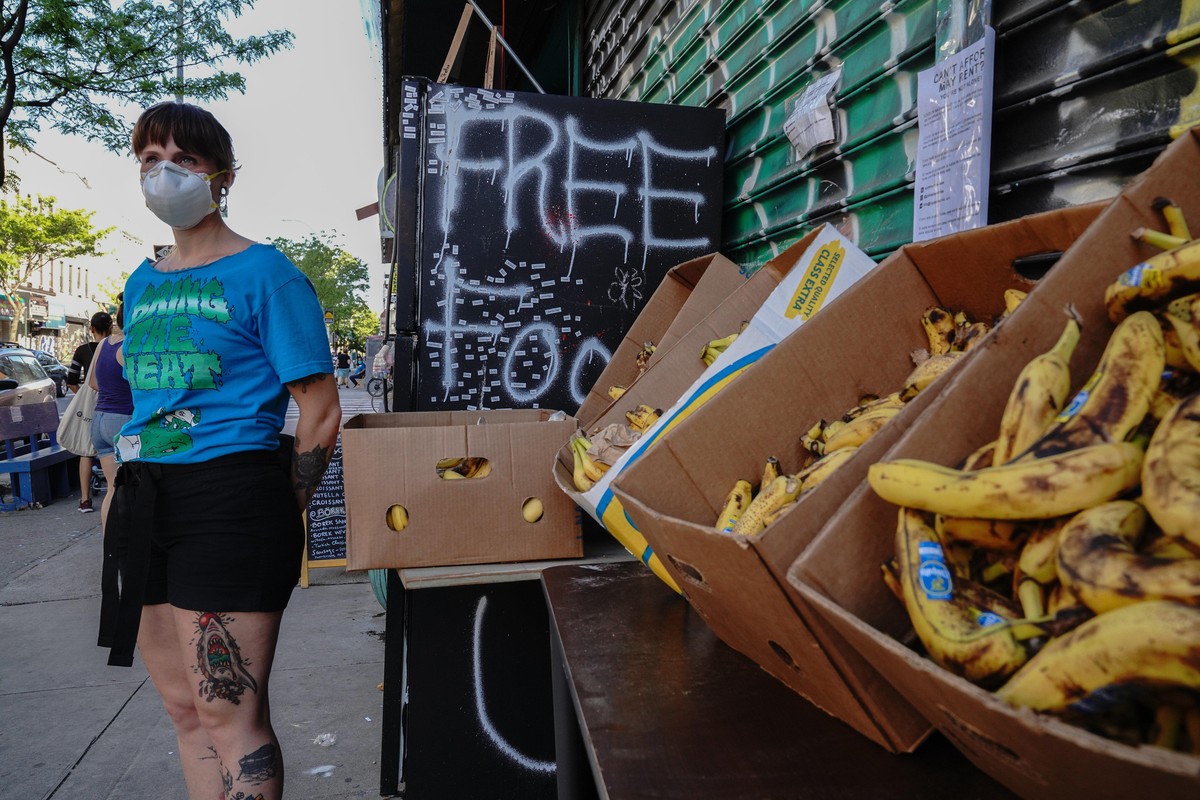 A view of Knickerbocker Free Food Fridge in Brooklyn offering frozen goods, fresh fruits and vegetables, books and diapers during the coronavirus pandemic on May 16, 2020 in New York City. COVID-19 ha ...