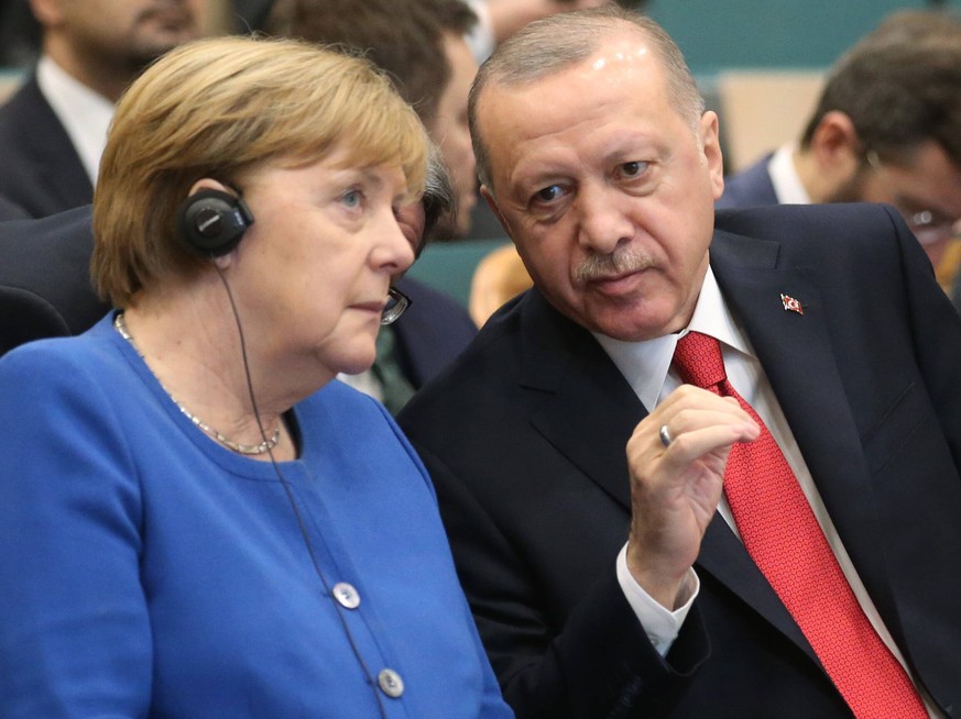 200124 -- ISTANBUL, Jan. 24, 2020 -- German Chancellor Angela Merkel L attends the opening ceremony of the Turkish-German University with Turkish President Recep Tayyip Erdogan in Istanbul, Turkey, Ja ...