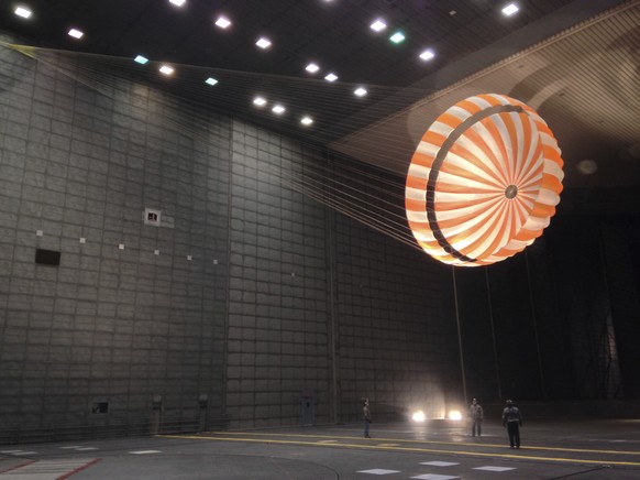 In this February 2015 photo made available by NASA, the parachute for the InSight mission to Mars is tested inside the world&#039;s largest wind tunnel at NASA Ames Research Center in Mountain View, C ...