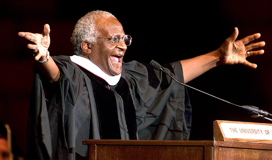 FILE - Archbishop Emeritus Desmond Tutu addresses new University of Oklahoma graduates, at a ceremony at the university after he received a honorary degree, Tuesday April 25, 2000 in Norman, Okla. Tut ...