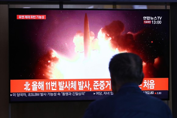 SEOUL, SOUTH KOREA - OCTOBER 02: People watch a TV showing a file image of a North Korean missile launch at the Seoul Railway Station on October 02, 2019 in Seoul, South Korea. North Korea fired what ...