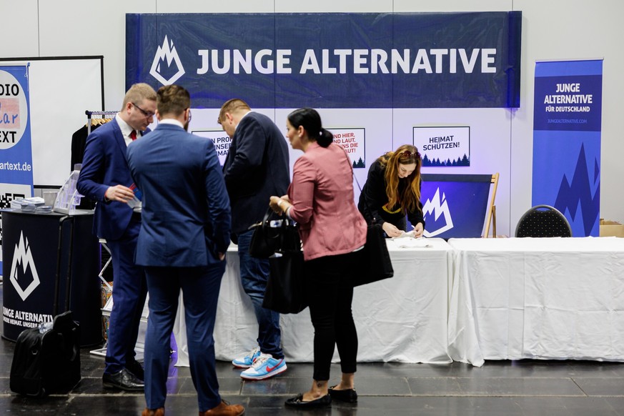 MAGDEBURG, GERMANY - JULY 29: Delegates at an information stand of the youth organization &quot;junge alternative&quot; of the right-wing Alternative for Germany (AfD) during a gathering of the right- ...