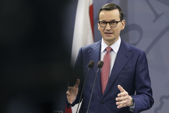 Poland&#039;s Prime Minister Mateusz Morawiecki speaks as he take parts in a joint press conference with Denmark&#039;s Prime Minister Mette Frederiksen, after a meeting in the Prime Minister&#039;s O ...