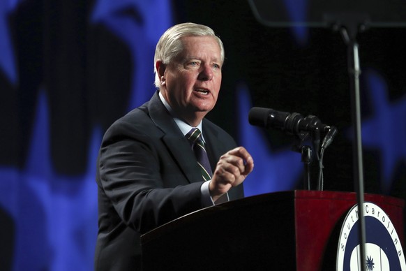 FILE - Sen. Lindsey Graham, R-S.C., speaks during the 56th annual Silver Elephant Gala in Columbia, S.C., Saturday, Aug. 5, 2023. A report released on Friday, Sept. 8, revealed that a special grand ju ...
