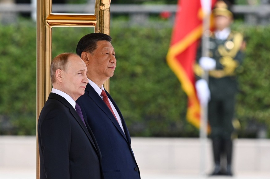 China Russia 8684035 16.05.2024 Russian President Vladimir Putin attends a welcome ceremony with Chinese President Xi Jinping outside the Great Hall of the People in Beijing, China. Sergey Bobylev / S ...