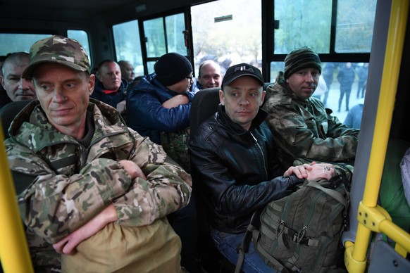 Russia Partial Mobilisation 8283704 26.09.2022 Men conscripted for military service during partial mobilization are seen in a bus outside a military commissariat in Novosibirsk, Russia. Russian Presid ...