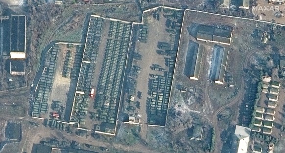 This satellite images provided by Maxar Technologies shows troops gathered at Bakhchysarai, Crimea, Tuesday, Feb. 1, 2022. (Maxar Technologies via AP)