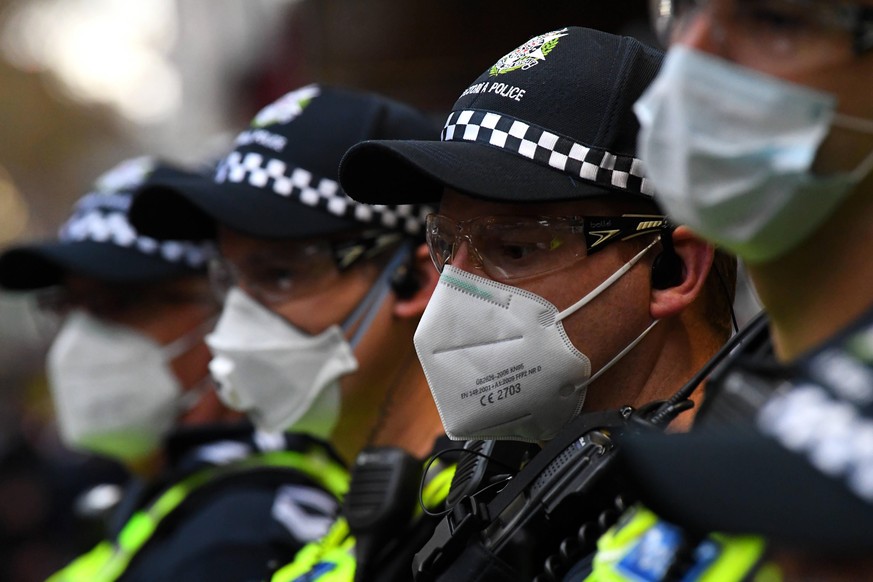 BLM PROTEST MELBOURNE, Victorian Police officers are seen during a Black Lives Matter rally in Melbourne, Saturday, June 6, 2020. The rally is in solidarity with the US protests over the killing of Ge ...