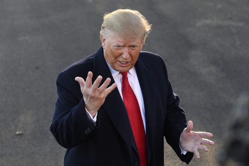 President Donald Trump talks to reporters on the South Lawn of the White House in Washington, Friday, Nov. 1, 2019. Trump is heading to Mississippi for a campaign event. (AP Photo/Susan Walsh)