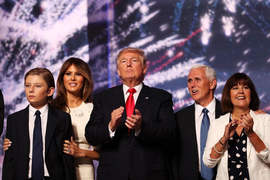 CLEVELAND, OH - JULY 21: (L-R) Barron Trump, Melania Trump, Republican presidential candidate Donald Trump, Republican vice presidential candidate Mike Pence and Karen Pence acknowledge the crowd at t ...