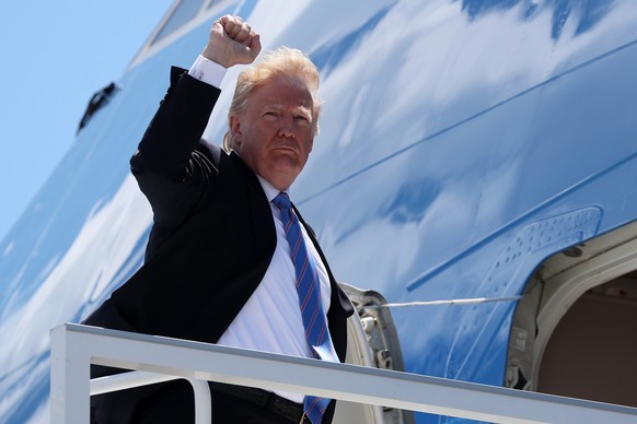 U.S. President Donald Trump boards Air Force One to depart for travel to Singapore from the Canadian Forces Base Bagotville, Quebec, Canada, June 9, 2018. REUTERS/Jonathan Ernst