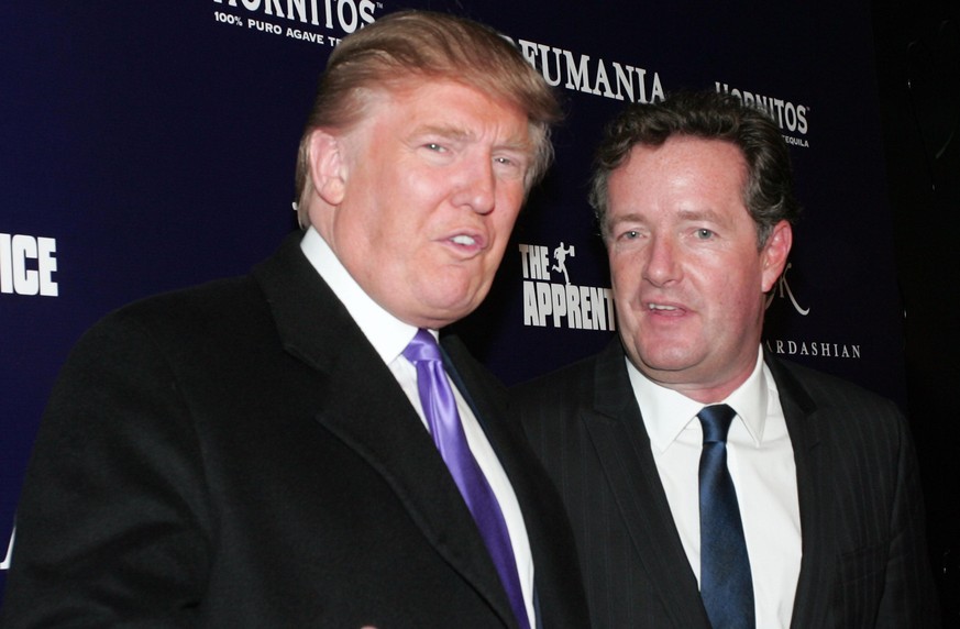 NEW YORK - NOVEMBER 10: Donald Trump (L) and Piers Morgan celebrate Kim Kardashian&#039;s appearance on &quot;The Apprentice&quot; at Provacateur on November 10, 2010 in New York, New York. (Photo by  ...