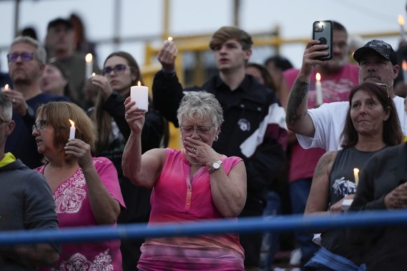 Family, friends and community attend a candlelight vigil for Corey Comperatore, the former fire chief shot and killed at a weekend rally for former President Donald Trump, Wednesday, July 17, 2024, at ...