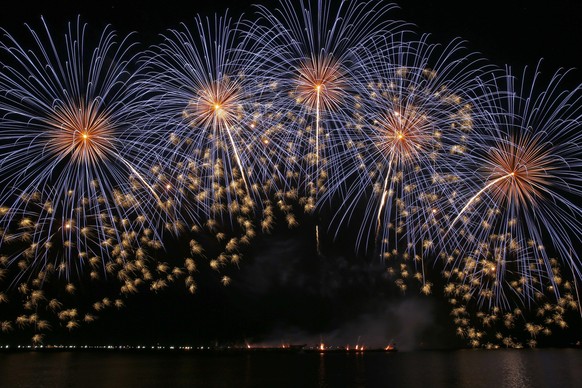 Fireworks from Yung Feng Fireworks Company in Taiwan light up the evening sky during the 9th Philippine International Pyromusical Competition Saturday, March 17, 2018 at the seaside Mall of Asia in su ...