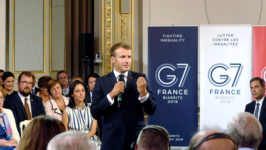 French President Emmanuel Macron delivers a speech on environment and social equality to business leaders on the eve of the G7 summit in Paris, France August 23, 2019. Michel Spingler/Pool via REUTERS