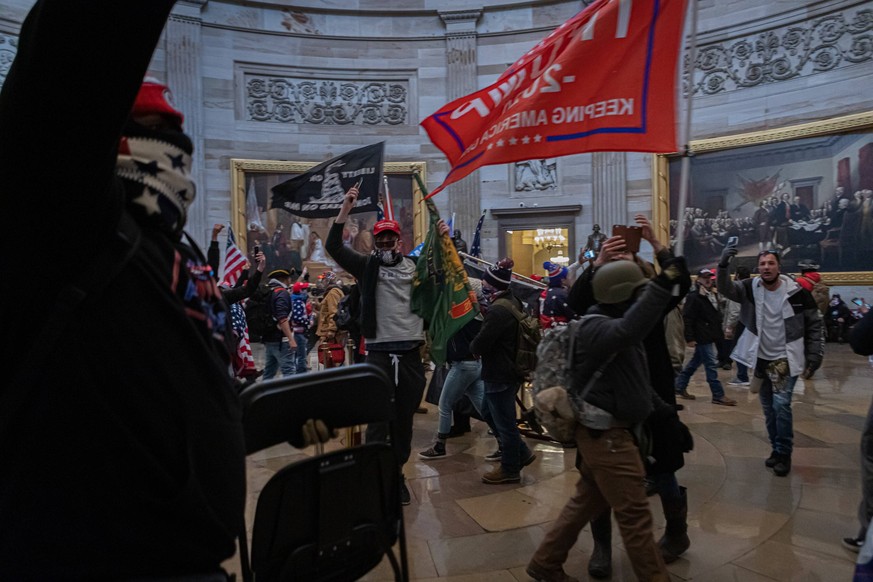 Pro-Trump Supporters Breach The US Capitol Building Pro-Trump protesters inside the US Capitol building. On January 6, 2021, Pro-Trump supporters and far-right forces flooded Washington DC to protest  ...