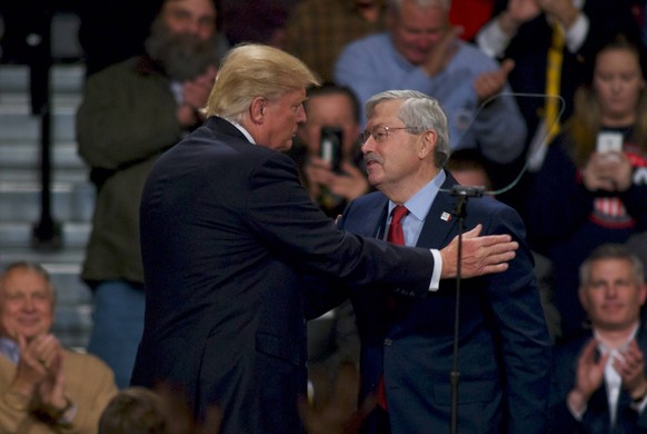 December 8, 2016 - Des Monies, Iowa, U.S - President Elect Donald Trump greets Iowa Governor Terry Branstad in front of the crowd of supporters in HyVee Hall at the Des Monies events center. The secon ...