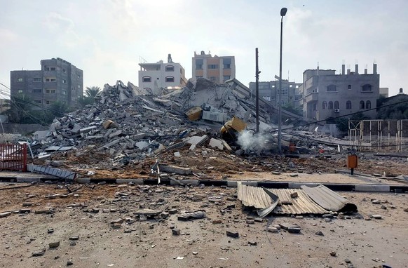 Israel Palestine Tentions 8532308 08.10.2023 A view shows the rubble of buildings destroyed in Israeli strikes, in the Gaza City, in Palestinian Territories. Israel was hit by an unprecedented rocket  ...