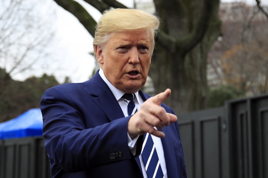 President Donald Trump speaks to the media as he leaves the White House, Tuesday, March 3, 2020, in Washington, to visit the National Institutes of Health's Vaccine Research Center in Bethesda, Md. (A ...