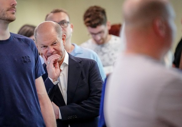 German Chancellor Olaf Scholz stands in line before voting during the European Parliament elections in Potsdam, Germany, June 9, 2024. Kay Nietfeld/Pool via REUTERS