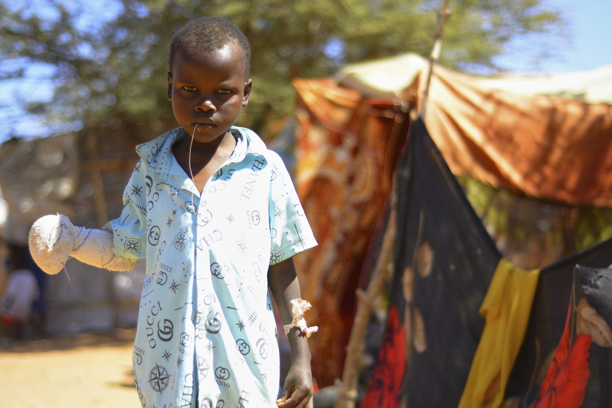 This November 2024 photo provided by the World Food Program shows a young internally displaced person at the ZamZam camp in El Fasher, North Darfur state, Sudan. (Mohamed Galal/WFP via AP)