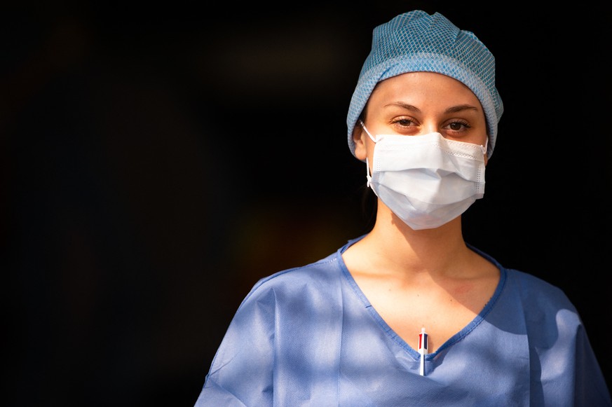 Portrait of a nurse wearing protective mask and body combination look on at Tenon hospital on March 28, 2020 in Paris as the country is under lockdown to stop the spread of the Covid-19 pandemic cause ...