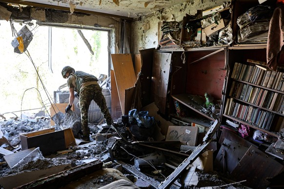 Russia Ukraine Donetsk Shelling 8744766 16.08.2024 A member of the DPR representative office in the Joint Center for Control and Coordination JCCC of issues related to Ukraine s war crimes works at th ...