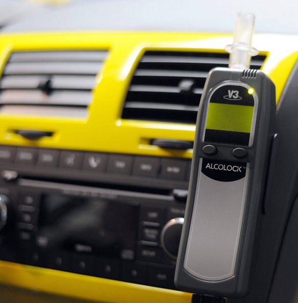 - MECHELEN, BELGIUM: Illustration picture shows a man demonstrating an alcolock , Monday 28 April 2008 in Mechelen. The driver of the car has to breath into the alcolock prior to start the car. If the ...