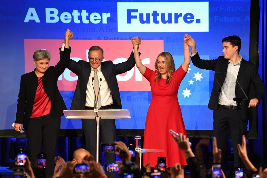 SYDNEY, AUSTRALIA - MAY 21: Penny Wong, Labor Leader Anthony Albanese, his partner Jodie Haydon and his son Nathan Albanese celebrate victory during the Labor Party election night event at Canterbury- ...
