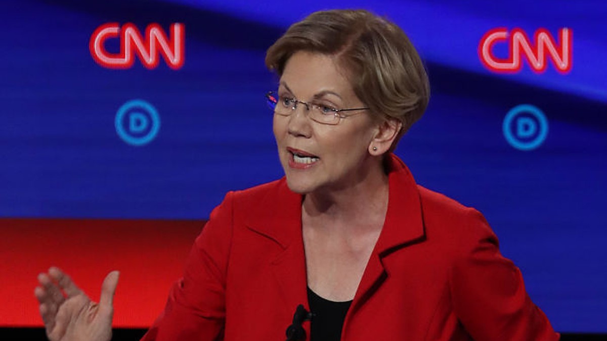 DETROIT, MICHIGAN - JULY 30: Democratic presidential candidate Sen. Elizabeth Warren (D-MA) (R) speaks during the Democratic Presidential Debate at the Fox Theatre July 30, 2019 in Detroit, Michigan. ...