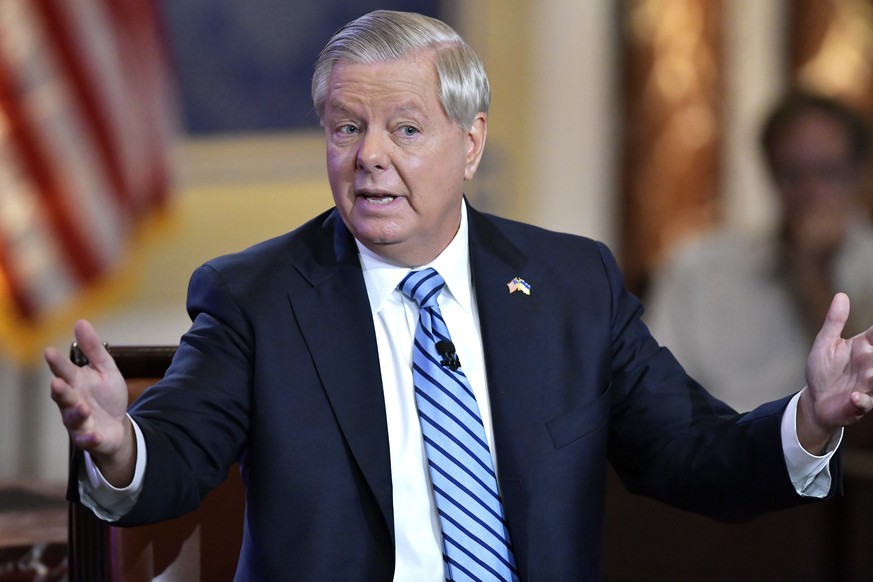 FILE - Sen. Lindsey Graham, R-S.C., speaks Monday, June 13, 2022, during a debate with Sen. Bernie Sanders, I-Vt, hosted by Fox News at the The Edward M. Kennedy Institute in Boston. The Georgia inves ...