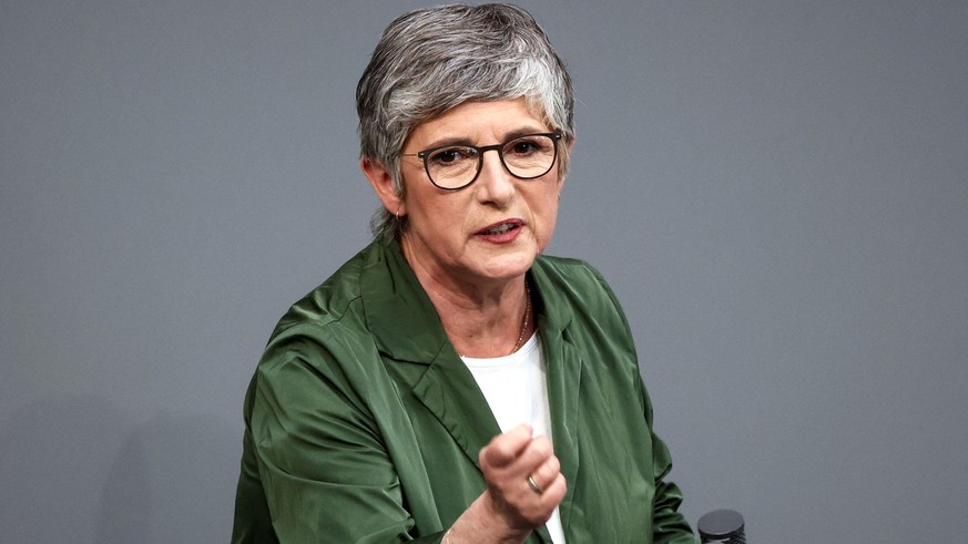 Co-leader of the Greens parliamentary fraction Britta Hasselmann speaks during an extraordinary session of the outgoing lower house of parliament, the Bundestag, for a vote to adopt the draft law brou ...