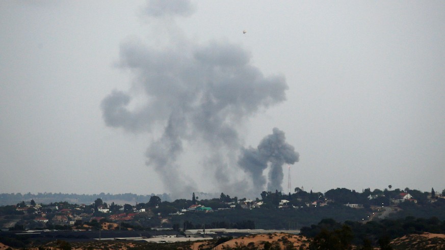 Smoke rises following an Israeli air strike on the Gaza Strip, as seen from the Israeli side of the border, May 12, 2018. REUTERS/Amir Cohen