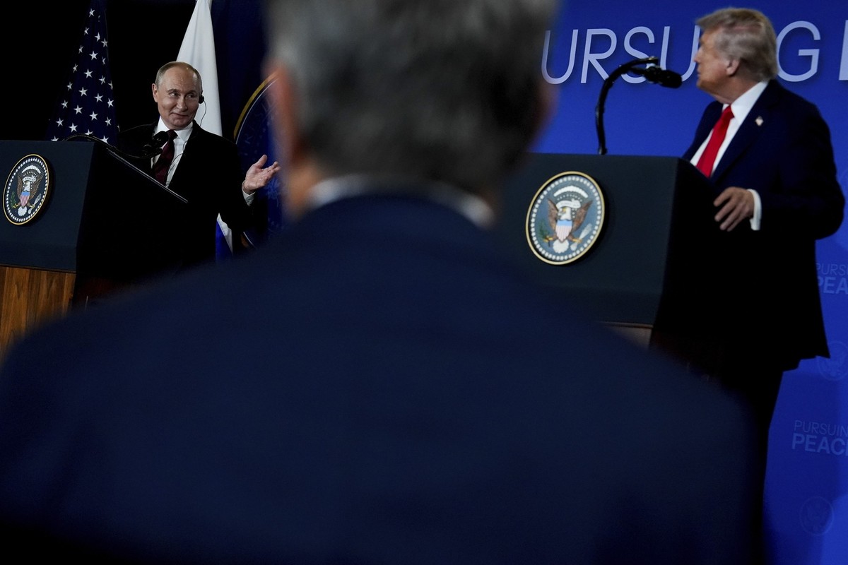 President Donald Trump listens as Russia&#039;s President Vladimir Putin speaks during a news conference at Joint Base Elmendorf- Richardson, Friday, Aug. 15, 2025, in Anchorage, Alaska. (AP Photo/Jul ...