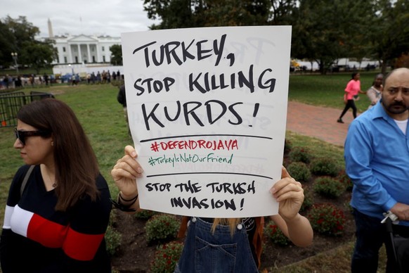 WASHINGTON, DC - OCTOBER 08: Activists gather in front of the White House to protest U.S. President Donald Trump’s decision to withdraw U.S. forces from northeast Syria October 8, 2019 in Washington,  ...