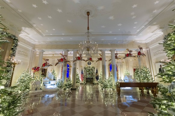 November 26, 2023, Washington, DC, United States: Sparkling winter do cor and Santas sled covers the Grand Foyer as part of the decorations at the annual White House Christmas, November 28, 2023 in Wa ...