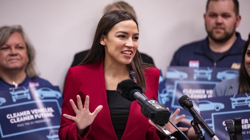 WASHINGTON, DC - FEBRUARY 06: Rep. Alexandria Ocasio-Cortez (D-NY) speaks during a press conference with Rep. Andy Levin (D-MI) about their new bill called the EV Freedom Act on Capitol Hill on Februa ...