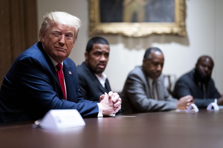 WASHINGTON, DC - JUNE 10: U.S. President Donald Trump winks during a round table discussion with African American supporters in the Cabinet Room of the White House on June 10, 2020 in Washington, DC.  ...