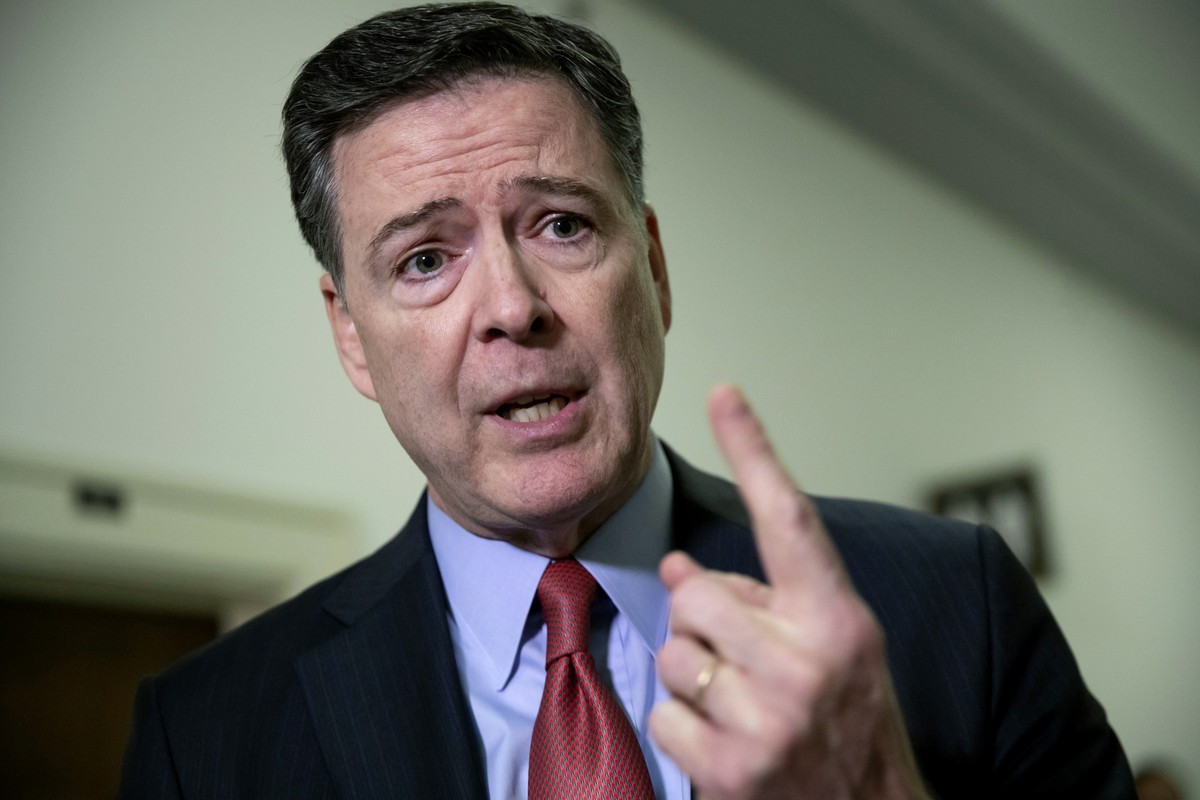 FILE - Former FBI Director James Comey speaks to reporters on Capitol Hill Washington, Dec. 17, 2018. The commissioner of the Internal Revenue Service has asked the Treasury Department’s inspector gen ...